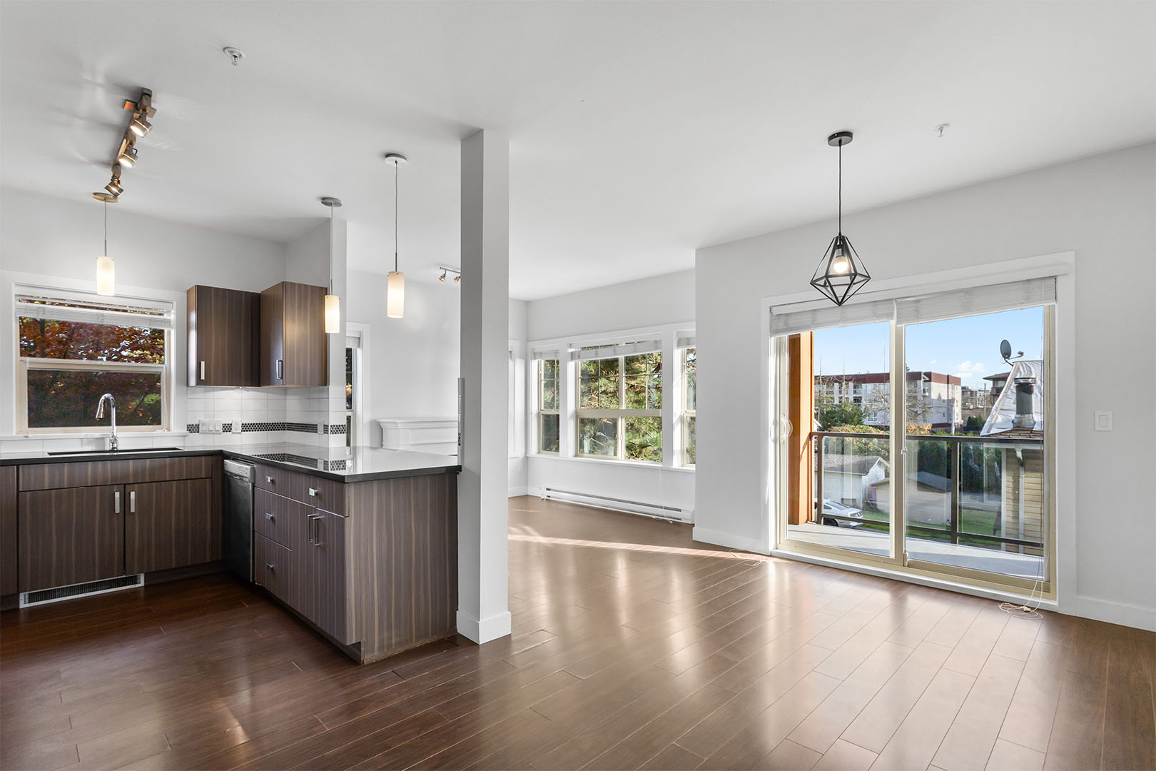 Ensuite bathroom with dual sinks and large mirror
