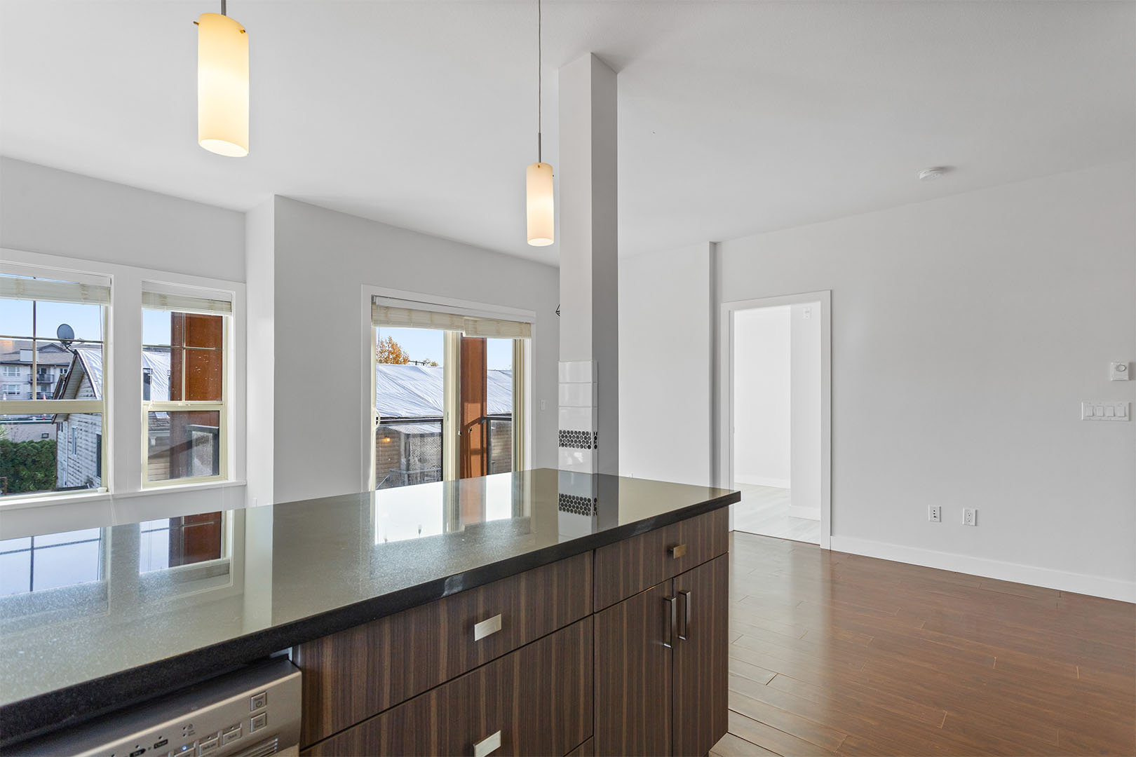 Secondary bedroom with closet and window